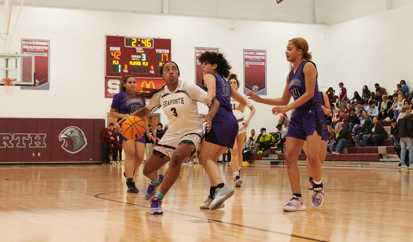 Seaforth sophomore Gabby White (3) drives to the hoop during the Hawks' 61-38 win over Carrboro on Friday night.