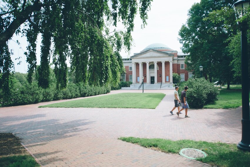 Students walk across the University of North Carolina at Chapel Hill's campus.