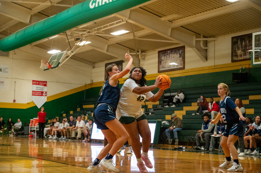 Northwood&rsquo;s Madelyn Brooks drives the lane against Union Pines Savannah McCaskill during the first round of the First Bank Charger Classic at Northwood High school in Pittsboro, NC on December 20, 2023.