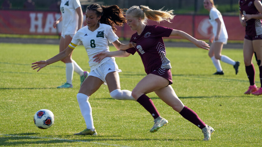 Seaforth junior Caitlyn Erman (2) races to the ball during the Hawks&rsquo; 4-0 win over Woods Charter. Erman had a goal and an assist in the victory.