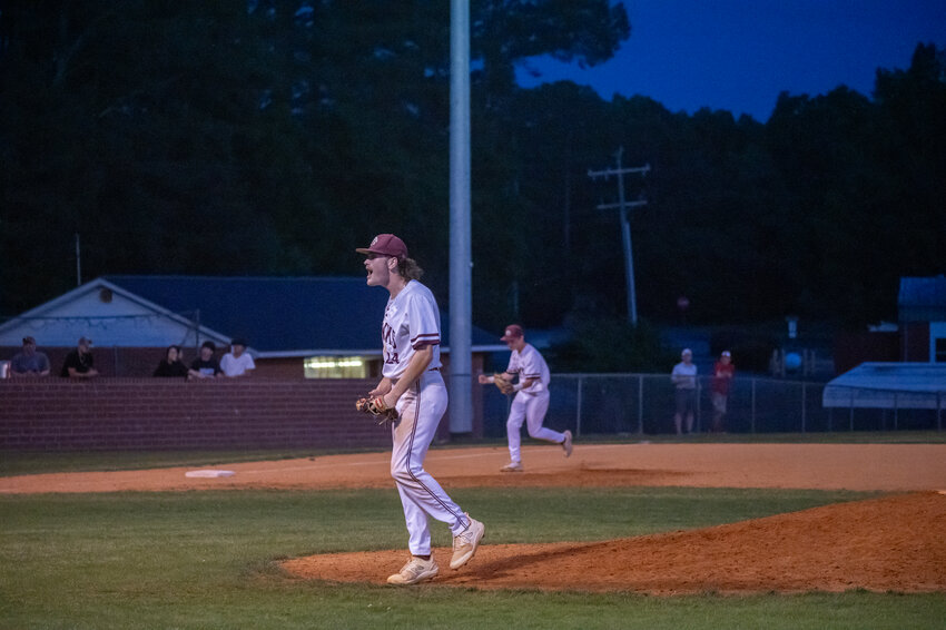 Seaforth&rsquo;s Tanner Morgan lets out a yell after striking out the final batter against Southeast Alamance during the Mid-Carolina Conference Championship at Chatham Central High School in Bear Creek, NC on May 2, 2024.