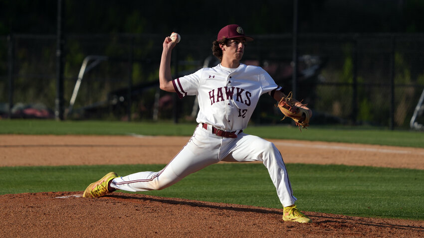 Senior Anders Johansson fires in a pitch during Seaforth&rsquo;s 4-1 win over West Craven in the second round of the NCHSAA playoffs.