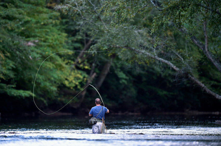A fly fisherman on the Chattahoochee River, Sept. 23, 2016, near Demorest, Ga. (AP Photo/Mike Stewart, File)