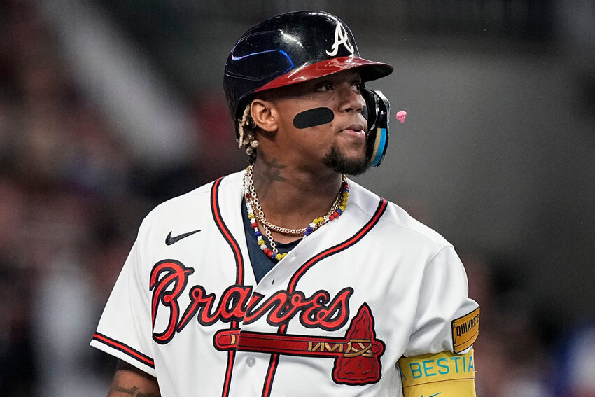 Atlanta Braves right fielder Ronald Acuna Jr. (13) flips his bat