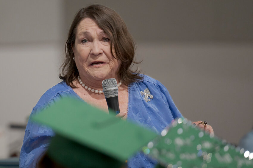 Kitty Sibley Morrison, principal and founder of the Springfield Preparatory School, speaks during a graduation ceremony of the school at Victory in Christ church in Holden, La., Aug. 5, 2023. (AP Photo/Matthew Hinton)