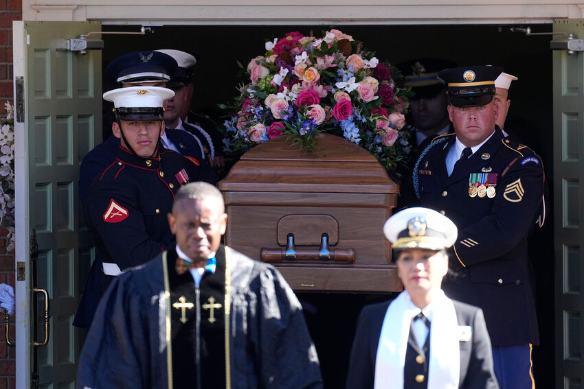 Members of the Armed Forces carry the casket after the funeral service for former first lady Rosalynn Carter at Maranatha Baptist Church, Wednesday, Nov. 29, 2023, in Plains, Ga. (AP Photo/John Bazemore)