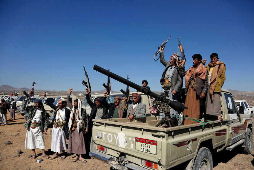 Houthi fighters and tribesmen stage a rally against U.S. and the U.K. strikes on Houthi-run military sites near Sanaa, Yemen, on Sunday, Jan. 14, 2024. (AP Photo, File)