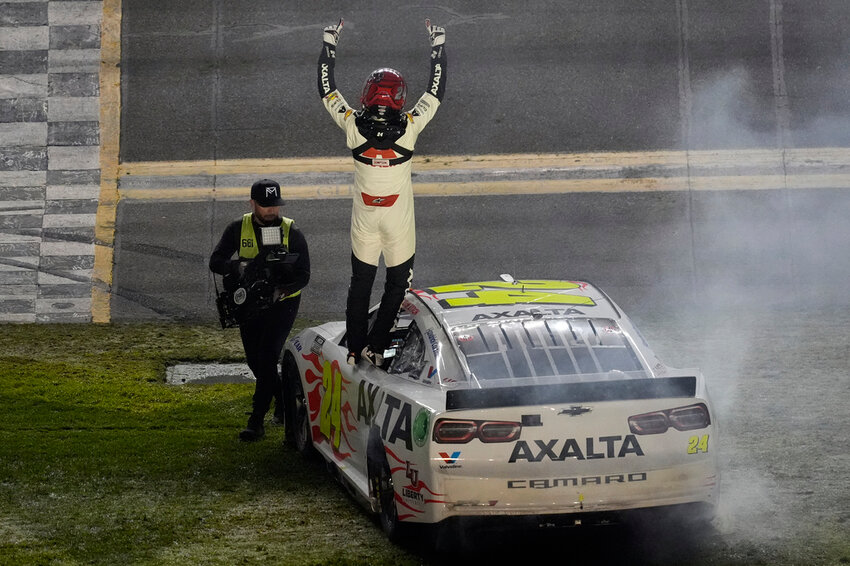 William Byron celebrates after winning the NASCAR Daytona 500, Monday, Feb. 19, 2024, at Daytona International Speedway in Daytona Beach, Fla. (AP Photo/Chris O'Meara)