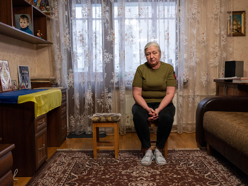 Iryna Reva, 59, waits for her son Vladyslav at her apartment in Kyiv, Ukraine on Feb. 9, 2024. (AP Photo/Evgeniy Maloletka)