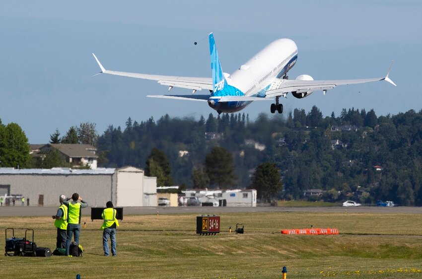 The final version of the 737 MAX, the MAX 10, takes off from Renton Airport in Renton, Wash., on its first flight Friday, June 18, 2021. (Ellen M. Banner/The Seattle Times via AP, Pool)