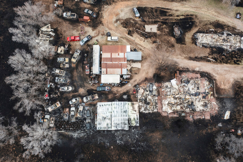 Multiple vehicles and multiple residences are seen destroyed by the Smokehouse Creek Fire in Canadian, Texas, Thursday, Feb. 29, 2024. (AP Photo/David Erickson)