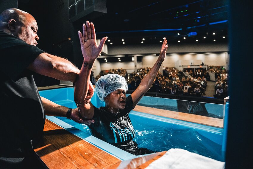 Bethany Hogg is baptized by her father Homer at Midway Church in Villa Rica, Ga. The count of baptisms among Georgia Baptist churches topped 21,000 in 2023, the largest number since 2016. (Photo/Midway Church)