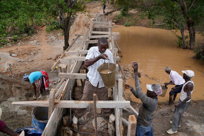 Residents in Machakos County, Kenya, construct a sand dam on Thursday, Feb. 29, 2024. (AP Photo/Brian Inganga)