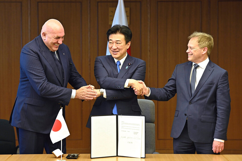 Britain's Defense Minister Grant Shapps, right, Italy's Defense Minister Guido Crosetto, left, and Japanese Defense Minister Minoru Kihara, center, shake hands after a signing ceremony for the Global Combat Air Programme (GCAP) at the defense ministry, Dec. 14, 2023, in Tokyo, Japan. (David Mareuil/Pool Photo via AP, File)