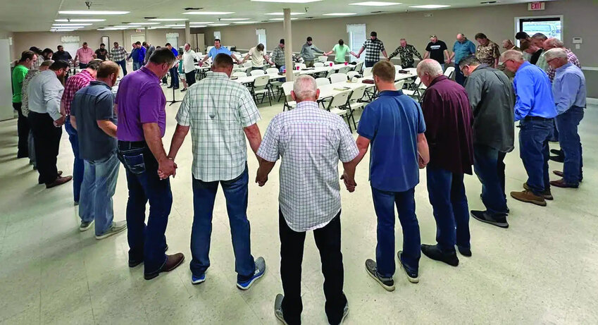 Men gather for a prayer breakfast at Colyell Baptist Church in March. (Photo/Baptist Message)
