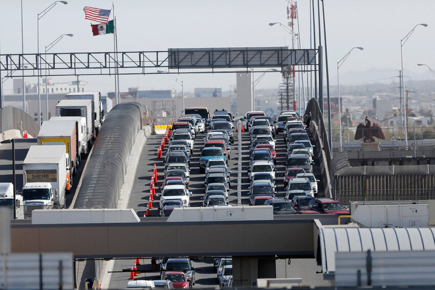 Cars and trucks line up to enter the U.S. from Mexico at a border crossing in El Paso, Texas, March 29, 2019. (AP Photo/Gerald Herbert, File)