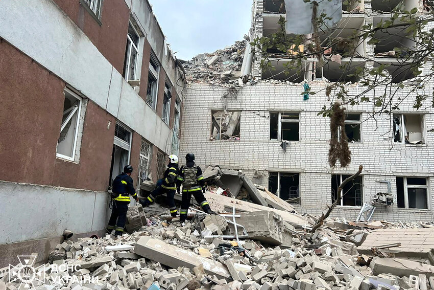 Rescuers work at the site of a Russian missile strike in Chernihiv, Ukraine, Wednesday, April 17, 2024. (Ukrainian Emergency Service via AP Photo)