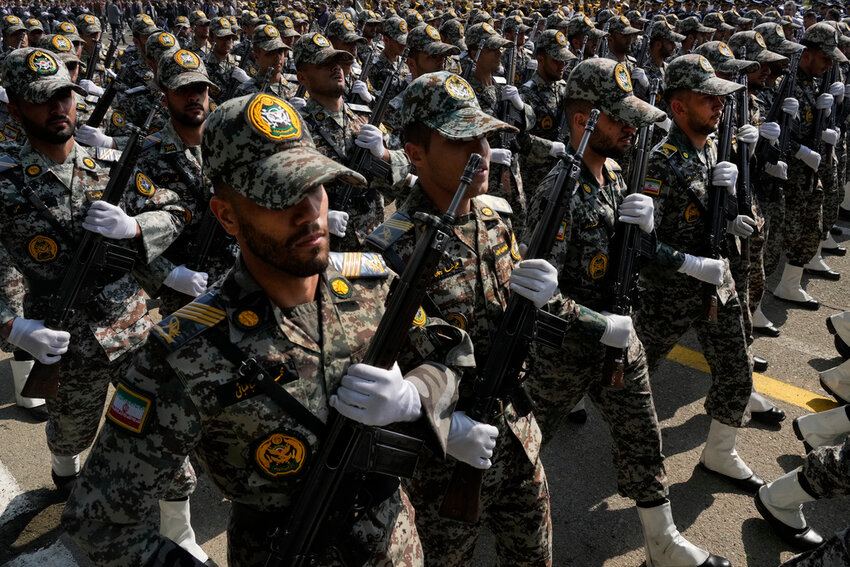 Iranian army members march during Army Day parade at a military base in northern Tehran, Iran, Wednesday, April 17, 2024. (AP Photo/Vahid Salemi)