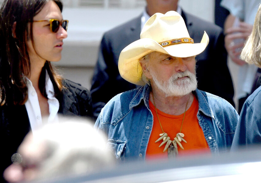 Dickey Betts, a founding member of the Allman Brothers Band, exits the funeral of Gregg Allman, June 3, 2017, in Macon, Ga. (Jason Vorhees/The Macon Telegraph via AP, File)