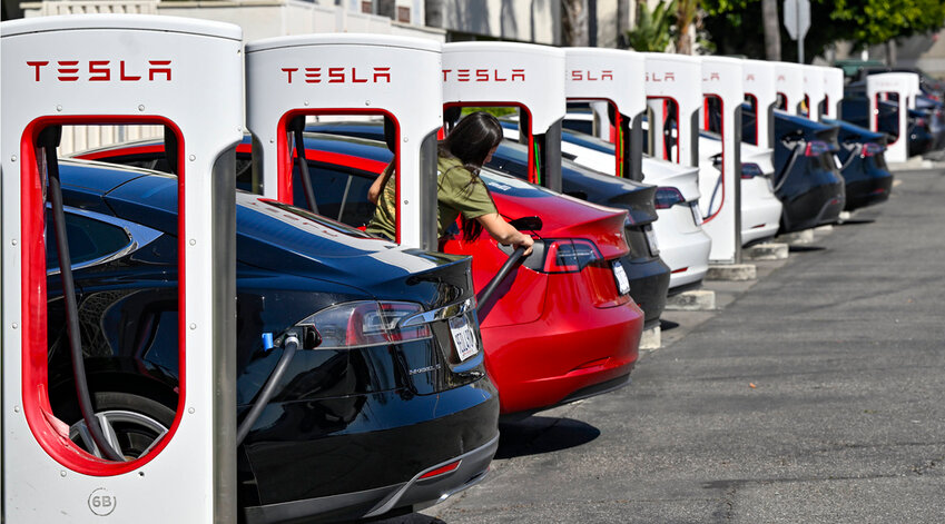 Drivers charge their Teslas in Santa Ana, Calif., on March 20, 2024. (Jeff Gritchen/The Orange County Register via AP, File)
