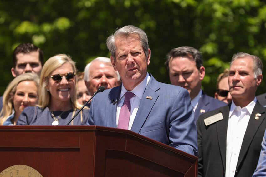 Georgia Gov. Brian Kemp makes remarks before signing Senate Bill 233 known as the Georgia Promise Scholarship Act at Liberty Plaza on Tuesday, April 23, 2024. (Natrice Miller/Atlanta Journal-Constitution via AP)