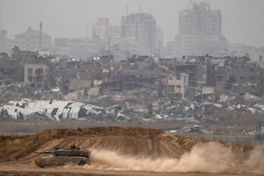 An Israeli tank near the Israeli-Gaza border, as seen from southern Israel, Thursday, April 25, 2024. (AP Photo/Leo Correa)