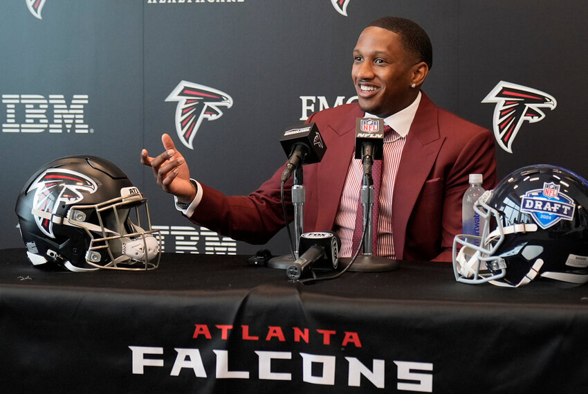 Atlanta Falcons first round draft choice quarterback Michael Penix Jr., speaks during a news conference Friday, April 26, 2024, in Flowery Branch, Ga. (AP Photo/John Bazemore)