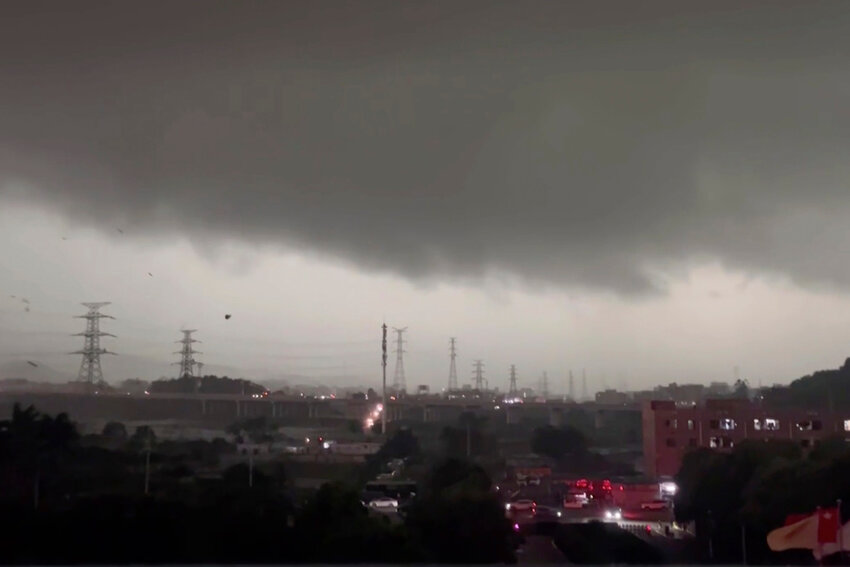 In this image taken from a video and released by Li Jiayi, storm clouds and strong wind are seen over the Baiyun district in the southern Chinese's city of Guangzhou on April 27, 2024. A tornado struck the southern Chinese city of Guangzhou on Saturday, killing some and damaging factory buildings, state media said. (Li Jiayi via AP)