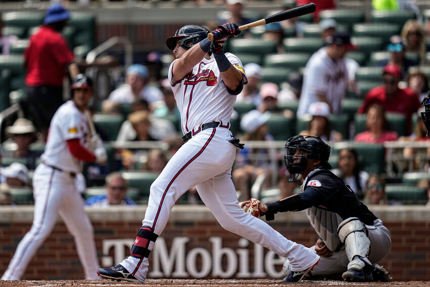 Atlanta Braves third baseman Austin Riley (27) hits a single against the Cleveland Guardians in the fourth inning of a baseball game, Sunday, April 28, 2024, in Atlanta. (AP Photo/Mike Stewart)