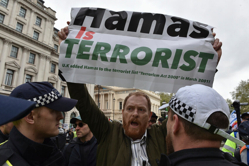 Pro-Israeli protesters take part in a demonstration along the route of the Pro-Palestinian march in London, Saturday, April 27, 2024. (AP Photo/Thomas Krych)