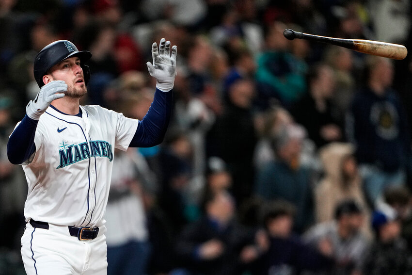 Seattle Mariners designated hitter Mitch Garver flips his bat after hitting a two-run walk-off home run against the Atlanta Braves during the ninth inning Monday, April 29, 2024, in Seattle. The Mariners won 2-1. (AP Photo/Lindsey Wasson)