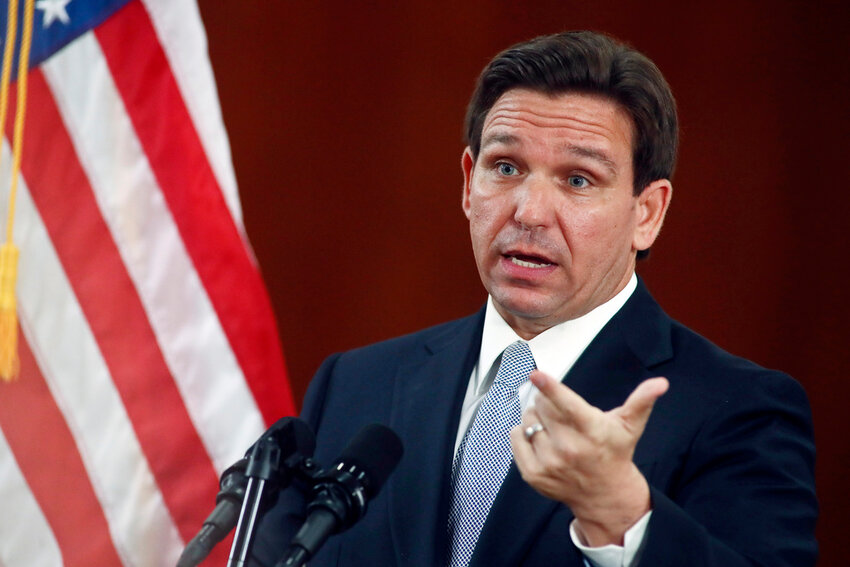 Florida Gov. Ron DeSantis answers questions from the media, March 7, 2023, at the state Capitol in Tallahassee, Fla. (AP Photo/Phil Sears, File)