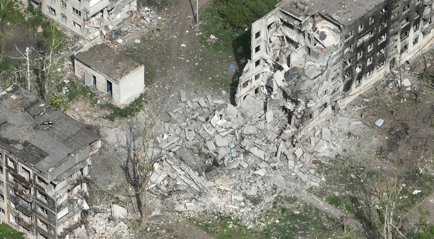 Destroyed buildings are seen in Chasiv Yar, an eastern Ukrainian city under assault by Russia troops, Monday, April 29, 2024. (Ukraine Patrol Police via AP)