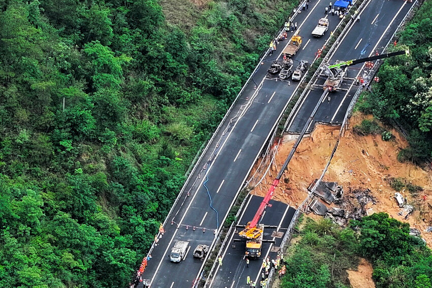Rescuers work at the site of a collapsed road section of the Meizhou-Dabu Expressway in Meizhou, south China's Guangdong Province, Wednesday, May 1, 2024. (Xinhua News Agency via AP)