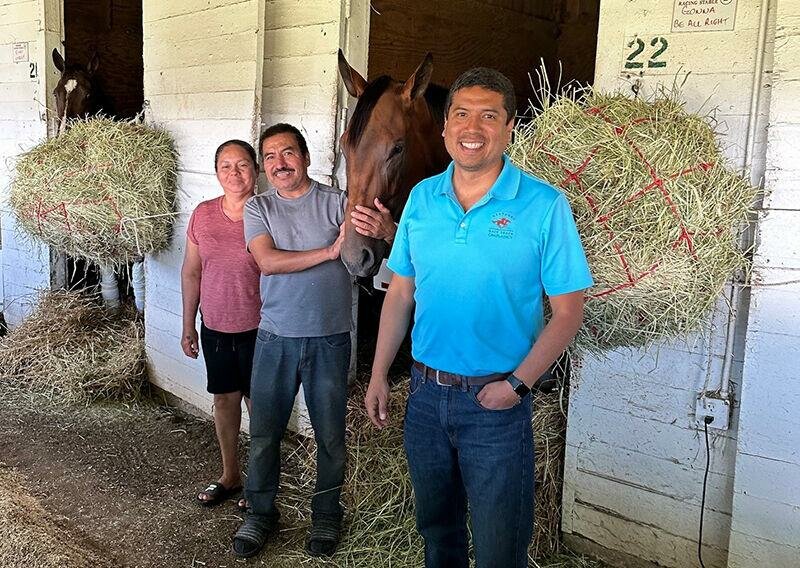 Pavel Urruchi has developed relationships with the workers on the backside of Churchill Downs. (Photo/Kentucky Today)