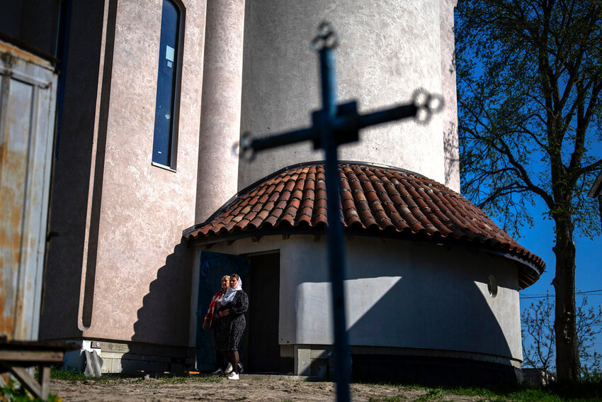 Christian Orthodox worshippers leave the chapel basement after attending a service at the Church of the Intercession of the Blessed Virgin Mary in, Lypivka, near Lviv, Ukraine, Sunday, April 28, 2024. (AP Photo/Francisco Seco)