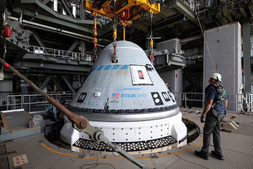 In this photo provided by NASA, the Boeing Starliner spacecraft is lifted at the Vertical Integration Facility at Space Launch Complex-41 at Cape Canaveral Space Force Station in Florida on Tuesday, April 16, 2024, for mounting on a United Launch Alliance Atlas V rocket for NASA's Boeing Crew Flight Test to the International Space Station for the agency's Commercial Crew Program. The first flight of Boeing’s Starliner capsule with a crew on board is scheduled for Monday, May 6, 2024. (Kim Shiflett/NASA via AP)