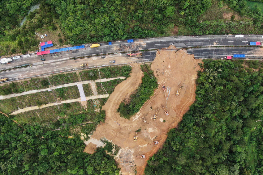 In this aerial photo released by Xinhua News Agency, rescue workers at the site of a collapsed section of a highway on the Meizhou-Dabu Expressway in Meizhou, southern China's Guangdong Province on May 2, 2024. (Wang Ruiping/Xinhua via AP)