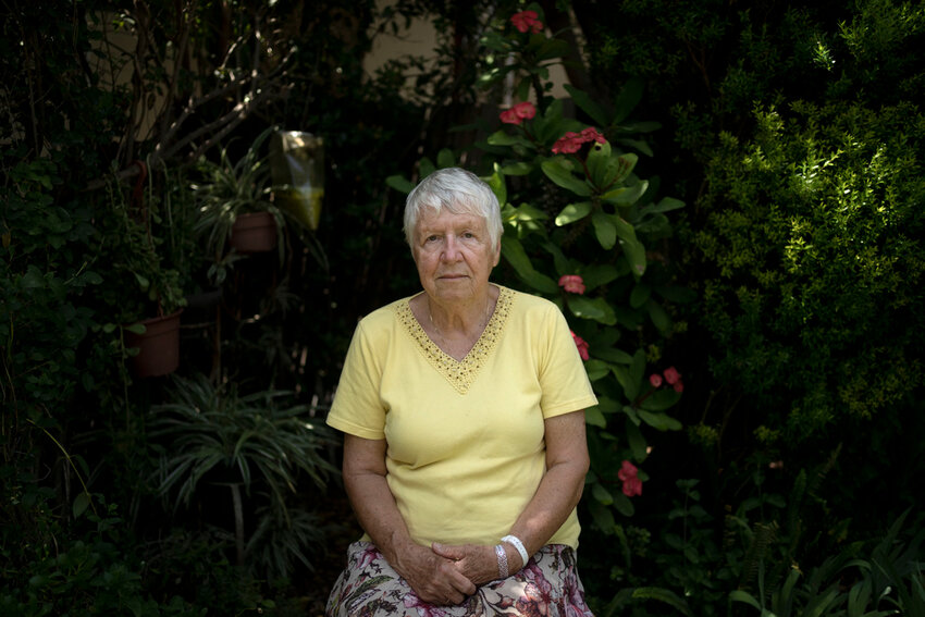 Judith Tzamir, a Holocaust survivor from Germany, poses for a portrait in her family home in Kibbutz Meflasim, southern Israel, Friday, May 3, 2024. On Monday, Tzamir will join 55 other Holocaust survivors from Israel and around the world for a memorial march in Poland, called March of the Living. (AP Photo/Maya Alleruzzo)