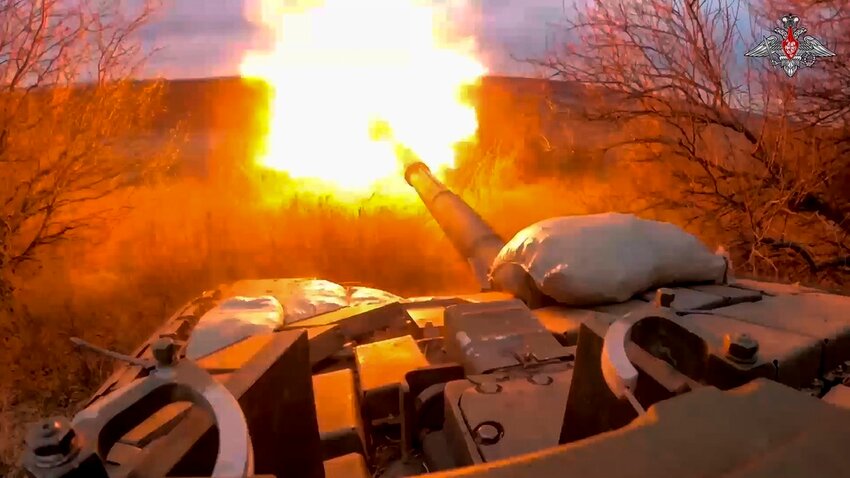 A Russian tank fires at Ukrainian troops from a position near the border with Ukraine in Russia’s Belgorod region. (Russian Defense Ministry Press Service via AP, File)