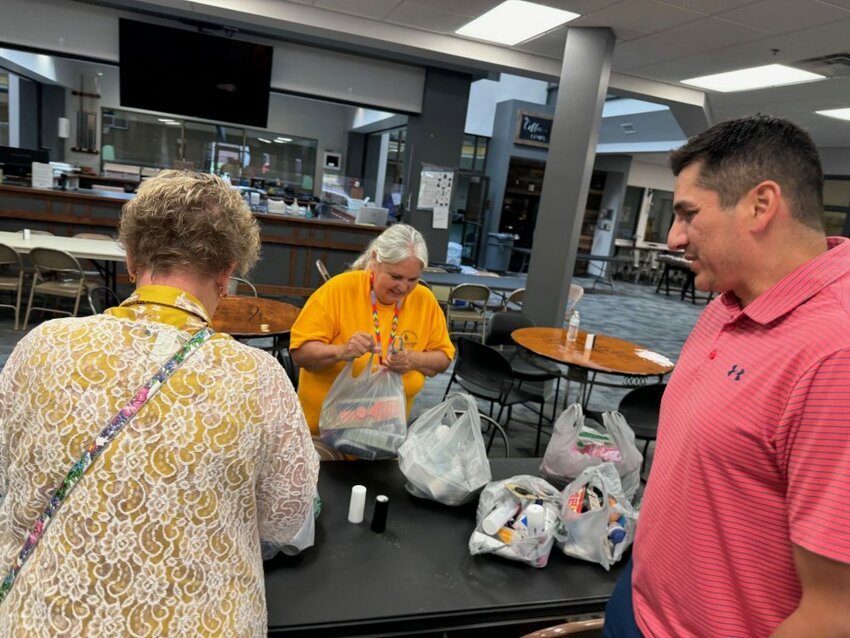 Rene Gamez, right, of Bartlesville, First helps oversee the Family Life Center which is hosting Oklahoma Baptist Disaster Relief. (Photo/The Baptist Messenger)