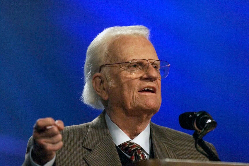 The Rev. Billy Graham addresses a gathering of about 40,000 people at Bulldog Stadium at Fresno State University in Fresno, Calif., Thursday, Oct. 11, 2001. (Mark Crosse/The Fresno Bee via AP, File)
