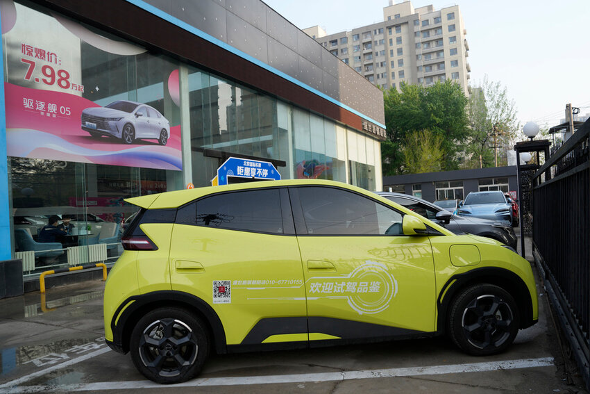 A Seagull electric vehicle from Chinese automaker BYD for test driving is parked outside a showroom in Beijing, Wednesday, April 10, 2024. (AP Photo/Ng Han Guan)