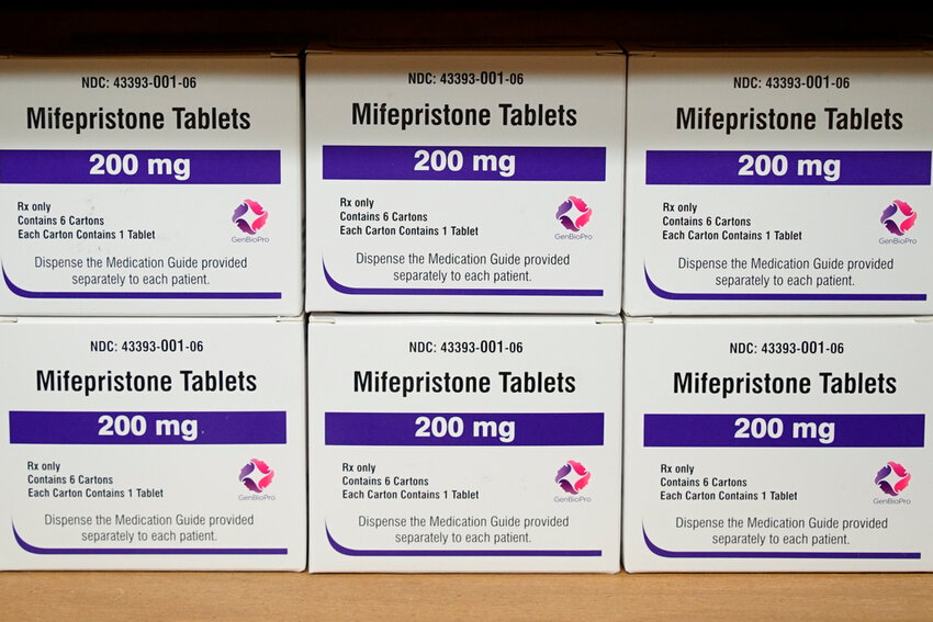 Boxes of the drug mifepristone sit on a shelf at the West Alabama Women's Center in Tuscaloosa, Ala., on March 16, 2022. (AP Photo/Allen G. Breed, File)
