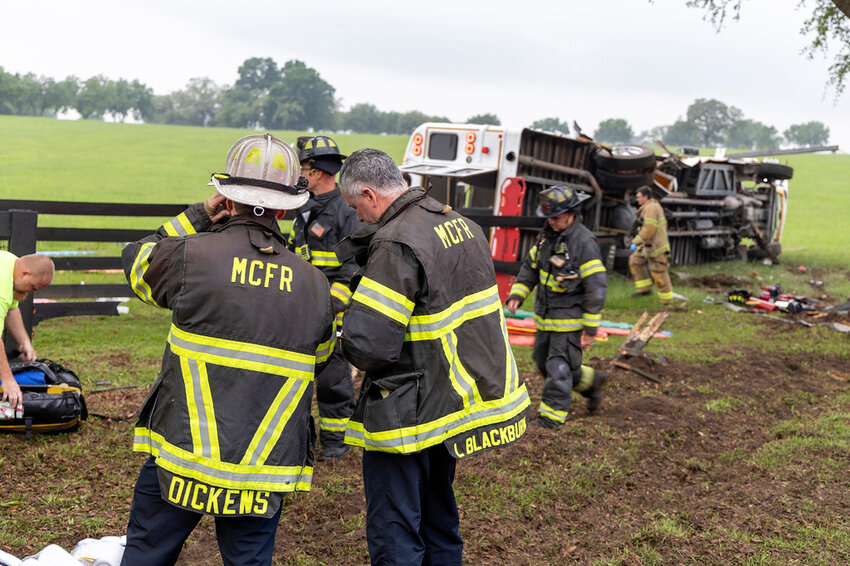 Crews from Marion County Fire Rescue and the Marion County Sheriff’s Office assist victims after a bus carrying farmworkers crashed and overturned early Tuesday, May 14, 2024, near Ocala, Fla. (Marion County Fire Rescue Dept. via AP)
