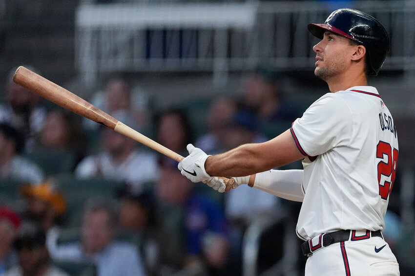 Atlanta Braves' Matt Olson watches his three-run home run in the fourth inning against the Chicago Cubs on Tuesday, May 14, 2024, in Atlanta. (AP Photo/John Bazemore)
