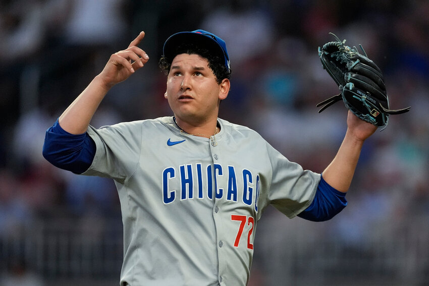Chicago Cubs pitcher Javier Assad reacts after getting the final out in the fourth inning against the Atlanta Braves on Wednesday, May 15, 2024, in Atlanta. (AP Photo/John Bazemore)