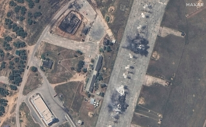 An overview of destroyed MiG 31 fighter aircraft and a fuel storage facility at Belbek air base, near Sevastopol, in Crimea, Thursday, May 16, 2024. (Satellite image ©2024 Maxar Technologies via AP)