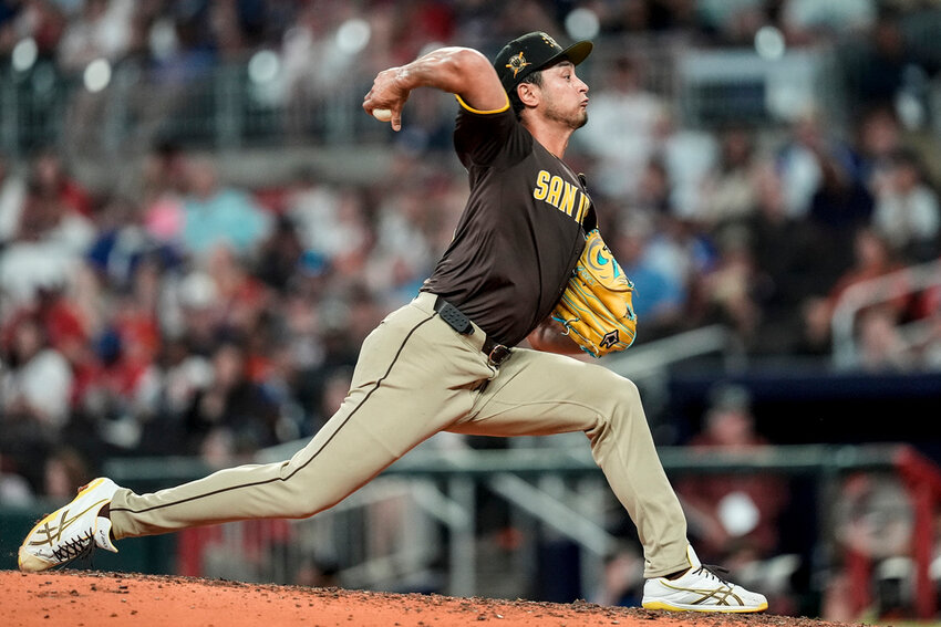 San Diego Padres pitcher Yu Darvish (11) works in the seventh inning against the Atlanta Braves, Sunday, May 19, 2024, in Atlanta. (AP Photo/Mike Stewart)