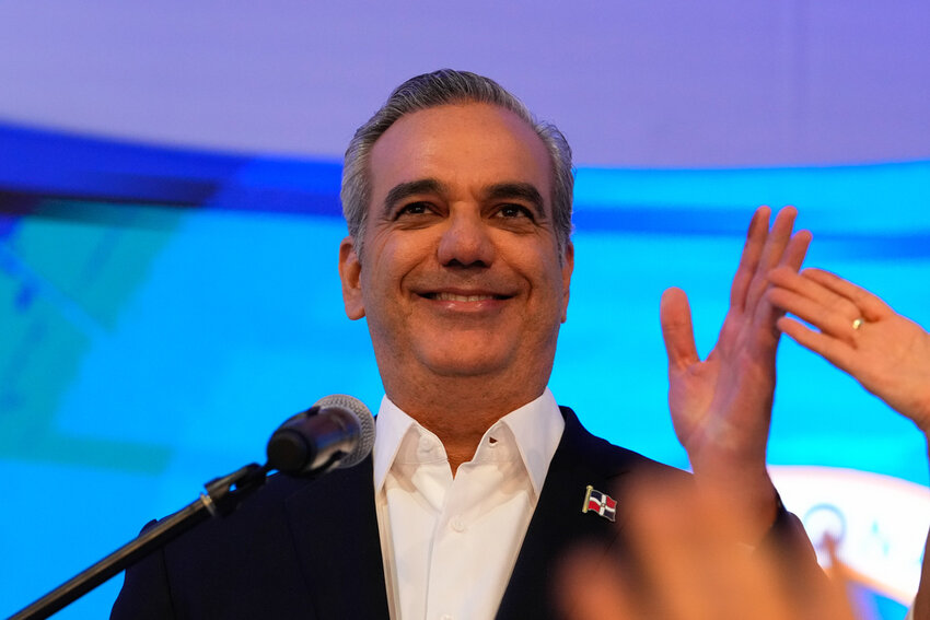 Incumbent presidential candidate Luis Abinader addresses supporters after the first vote count showed him leading in general elections in Santo Domingo, Dominican Republic, Sunday, May 19, 2024. (AP Photo/Matias Delacroix)